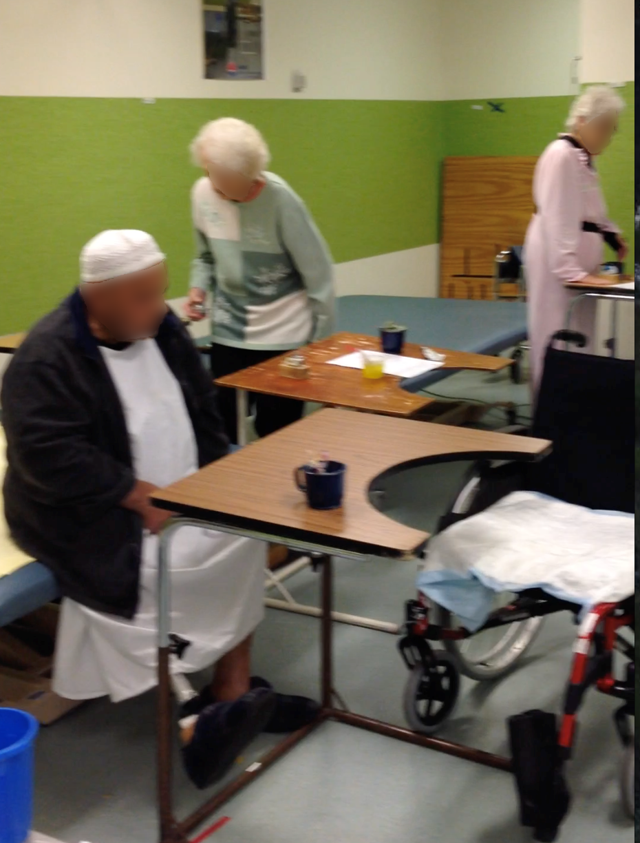 Three people practising sit to stand and standing exercises